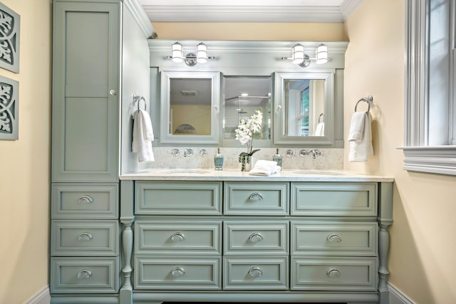 52 Hardy Rd, Bedford, NH 03110 - bathroom featuring double vanity, ornamental molding, and baseboards