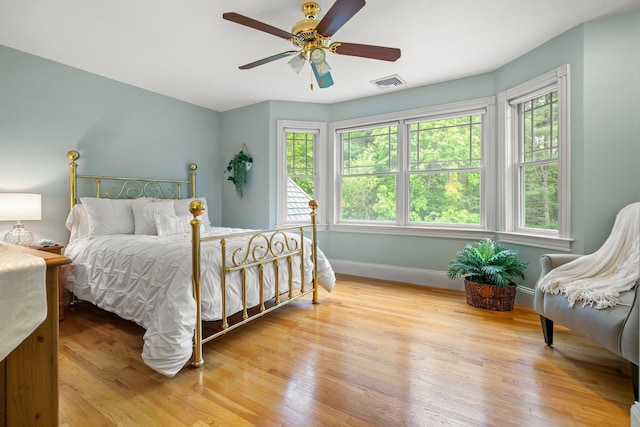 52 Hardy Rd, Bedford, NH 03110 - bedroom featuring baseboards, wood finished floors, and ceiling fan