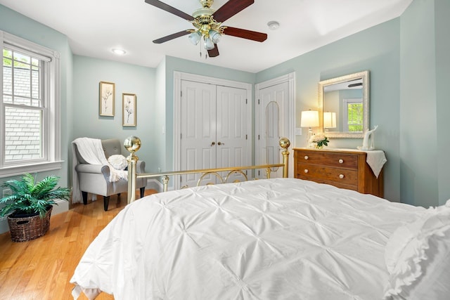 52 Hardy Rd, Bedford, NH 03110 - bedroom with wood finished floors, ceiling fan, and two closets