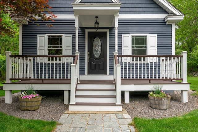 52 Hardy Rd, Bedford, NH 03110 - doorway to property featuring covered porch
