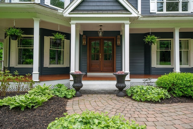 52 Hardy Rd, Bedford, NH 03110 - doorway to property with a porch