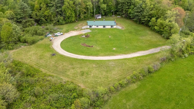 122 Flagg Rd, Rochester, NH 03839 - aerial view of property and surrounding area featuring a heavily wooded area