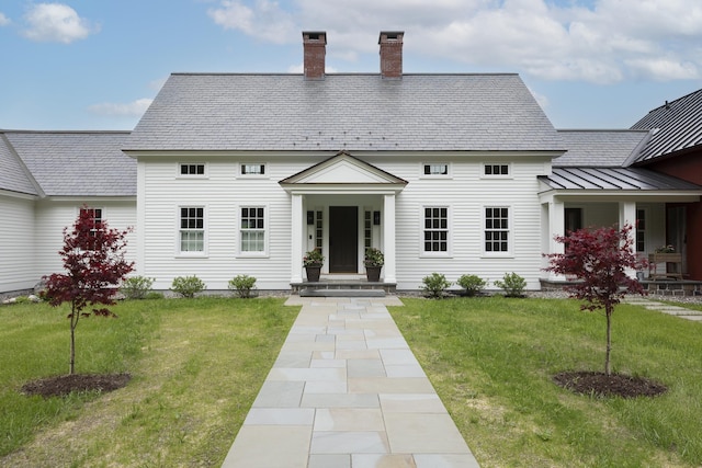 1640 Three Maple Dr, Manchester, VT 05255 - view of front of property with a chimney, a high end roof, and a front yard