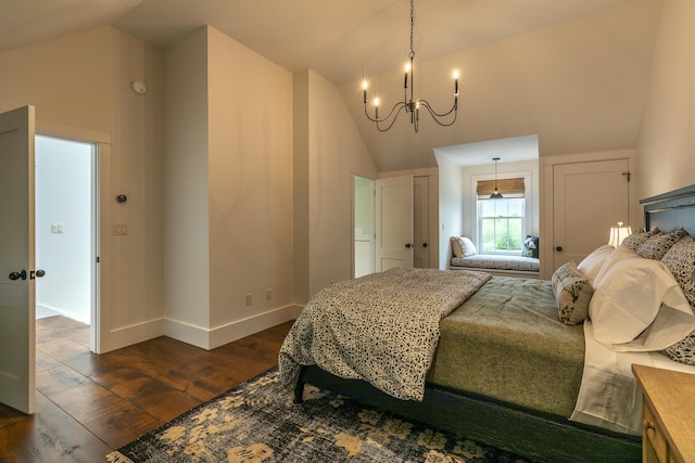 1640 Three Maple Dr, Manchester, VT 05255 - bedroom with a chandelier, dark wood-style floors, baseboards, and high vaulted ceiling