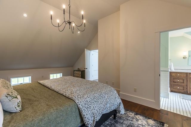 1640 Three Maple Dr, Manchester, VT 05255 - bedroom with lofted ceiling, dark wood-style floors, a chandelier, ensuite bath, and baseboards