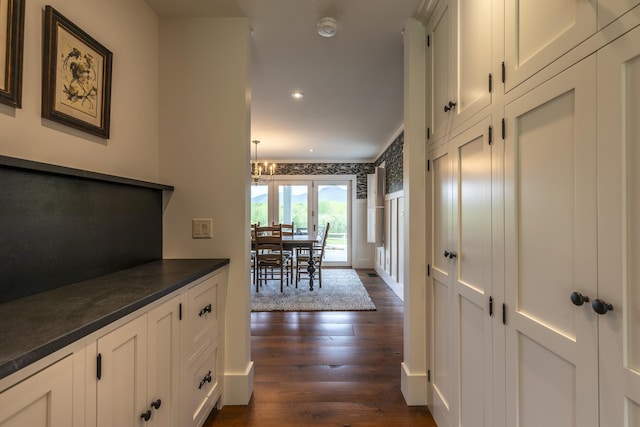 1640 Three Maple Dr, Manchester, VT 05255 - kitchen featuring dark countertops, dark wood-style floors, white cabinets, recessed lighting, and wallpapered walls