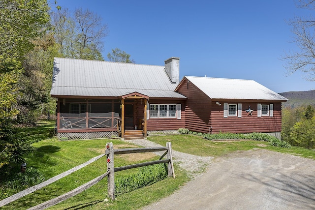 31 Highland View Rd, Weston, VT 05161 - log-style house with a chimney, covered porch, and metal roof