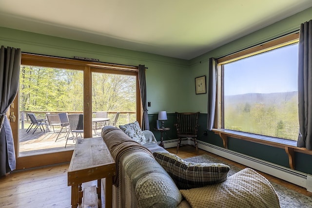 31 Highland View Rd, Weston, VT 05161 - living room with wood-type flooring and baseboard heating