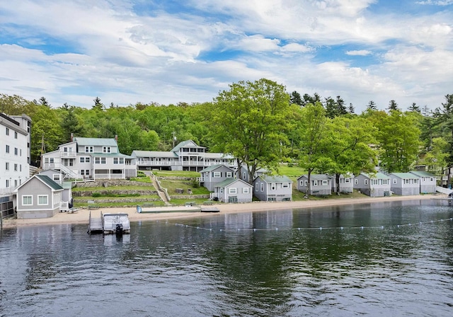 1144 Weirs Blvd Unit 20, Laconia, NH 03246 - water view with a floating dock and nearby suburban area