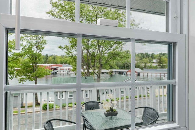 1144 Weirs Blvd Unit 20, Laconia, NH 03246 - sunroom / solarium with a water view and plenty of natural light
