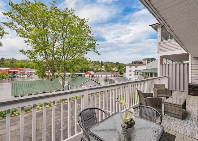 1144 Weirs Blvd Unit 20, Laconia, NH 03246 - balcony featuring outdoor dining area