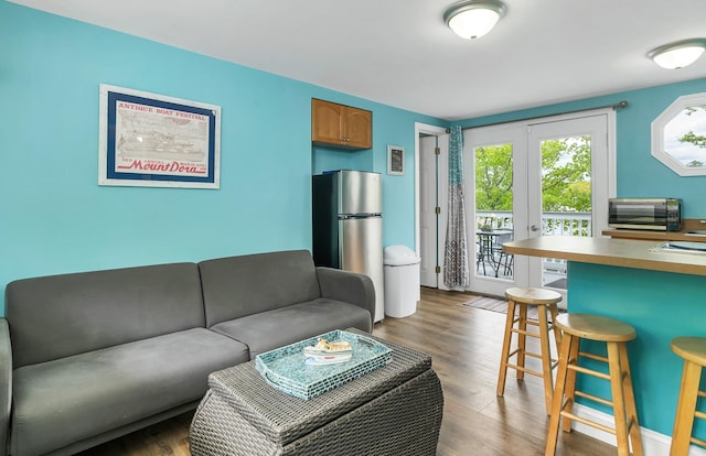 1144 Weirs Blvd Unit 20, Laconia, NH 03246 - living room featuring wood finished floors and french doors