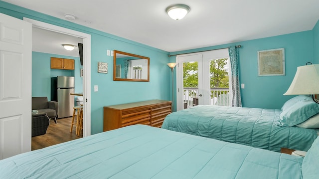 1144 Weirs Blvd Unit 20, Laconia, NH 03246 - bedroom with freestanding refrigerator, access to exterior, wood finished floors, and french doors