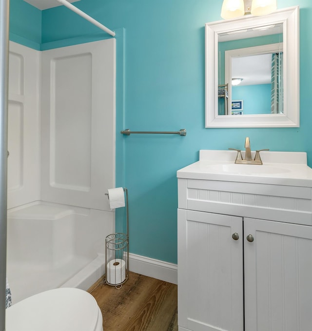 1144 Weirs Blvd Unit 20, Laconia, NH 03246 - bathroom with a shower, vanity, toilet, and wood finished floors
