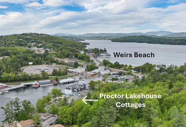 1144 Weirs Blvd Unit 20, Laconia, NH 03246 - drone / aerial view of a water and mountain view