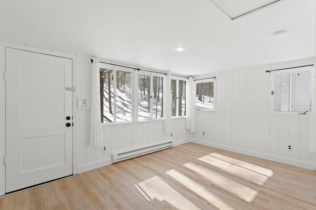 70 Broadway Dr, Amherst, NH 03031 - entryway featuring a baseboard heating unit, wood finished floors, and baseboards