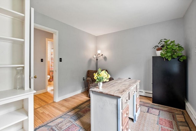 47 Dell Rd, Springfield, VT 05156 - office space featuring light wood-type flooring, a baseboard radiator, and baseboards