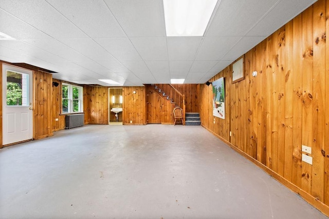 47 Dell Rd, Springfield, VT 05156 - below grade area featuring wood walls, stairway, and baseboards