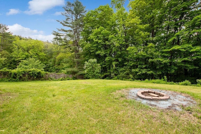 47 Dell Rd, Springfield, VT 05156 - view of yard featuring an outdoor fire pit and a wooded view