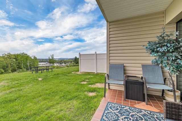 375 Endicott N St Unit 103, Laconia, NH 03246 - view of green lawn featuring a mountain view and a patio area