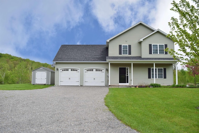 190 Ryans Way, Fletcher, VT 05448 - view of front of home featuring gravel driveway, an attached garage, and a front yard