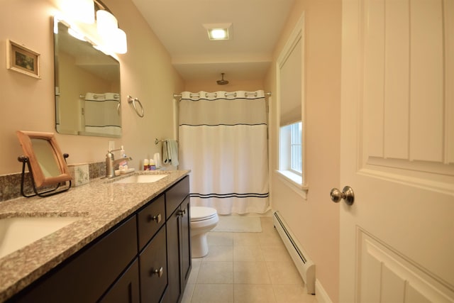 190 Ryans Way, Fletcher, VT 05448 - bathroom featuring a baseboard radiator, double vanity, toilet, tile patterned floors, and a shower with curtain