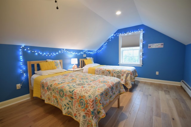 190 Ryans Way, Fletcher, VT 05448 - bedroom with baseboards, wood finished floors, and vaulted ceiling