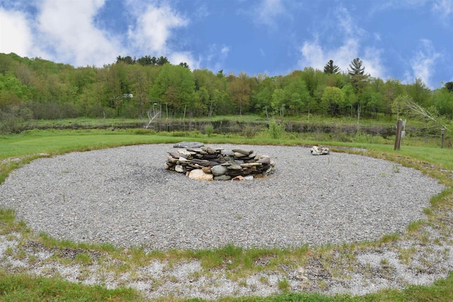 190 Ryans Way, Fletcher, VT 05448 - view of yard featuring an outdoor fire pit and a view of trees
