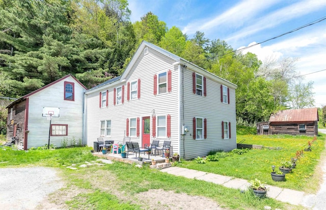 95 Main St, Wells River, VT 05081 - view of front of home with a patio and a front yard