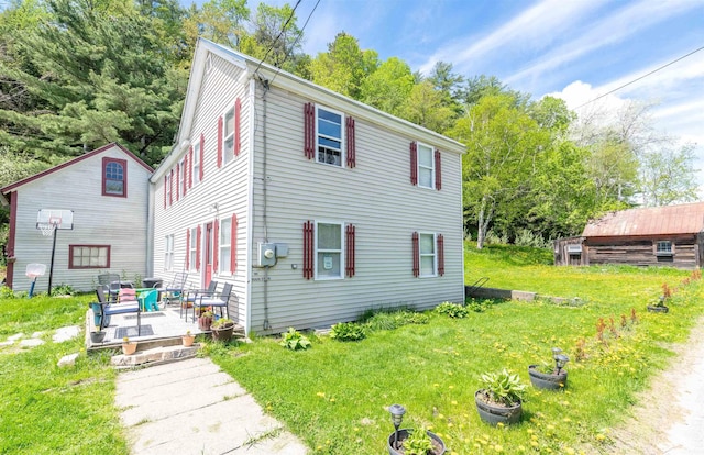 95 Main St, Wells River, VT 05081 - view of front of property with a patio area and a front yard