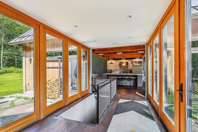 249 Falls Brook Ln, Stowe, VT 05672 - unfurnished sunroom featuring healthy amount of natural light, wood finished floors, recessed lighting, french doors, and a sink