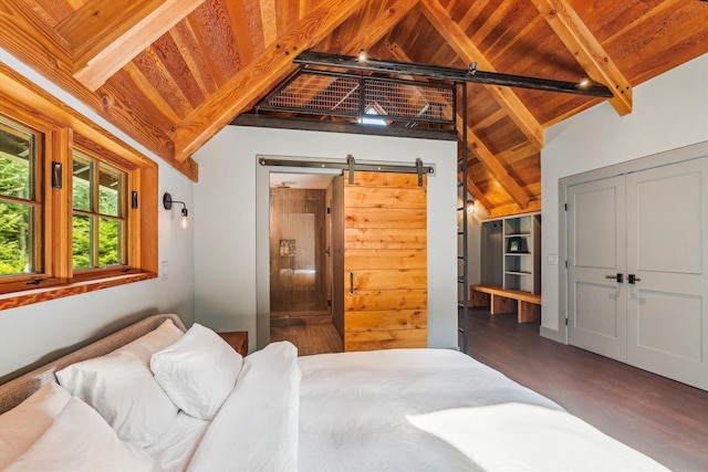 249 Falls Brook Ln, Stowe, VT 05672 - bedroom with wood finished floors, a barn door, and wooden ceiling
