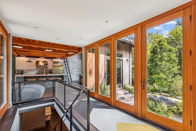 249 Falls Brook Ln, Stowe, VT 05672 - entryway featuring wood finished floors and a sink