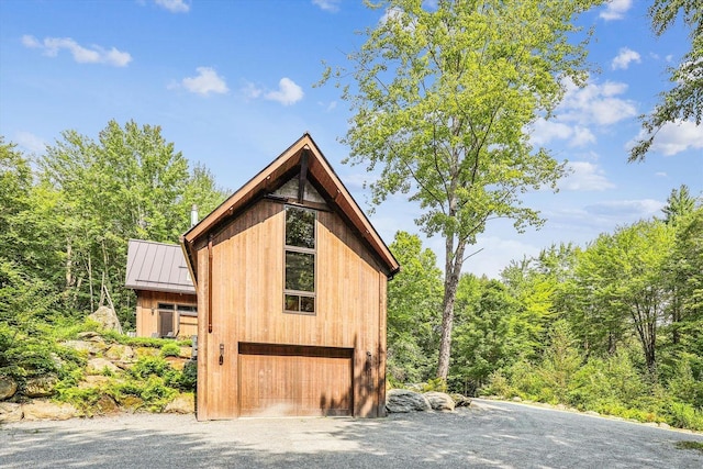 249 Falls Brook Ln, Stowe, VT 05672 - view of outdoor structure featuring driveway