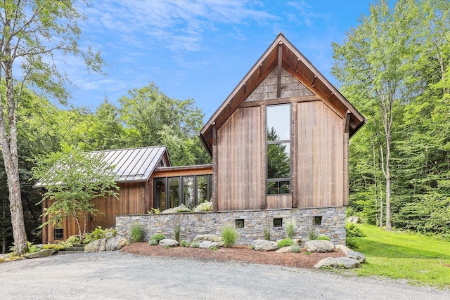 249 Falls Brook Ln, Stowe, VT 05672 - view of side of property featuring a standing seam roof and metal roof