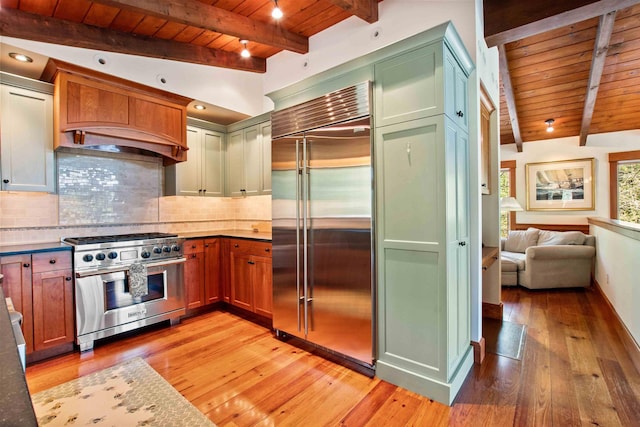 87 Deerpath Rd, New London, NH 03257 - kitchen with high end appliances, wood ceiling, light wood-style flooring, decorative backsplash, and open floor plan