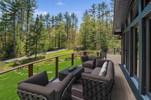87 Deerpath Rd, New London, NH 03257 - wooden deck with an outdoor living space and a lawn