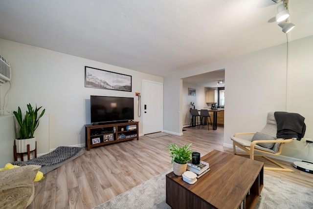 205 Circle Rd Unit 2, Manchester, NH 03103 - living room featuring wood finished floors and baseboards