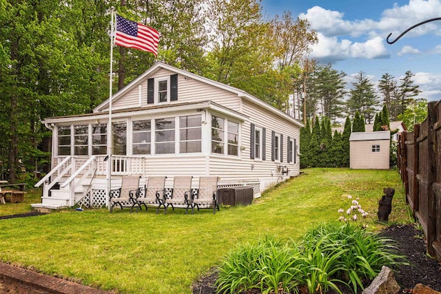 22 Kingsbury Dr, Milton, NH 03851 - rear view of property featuring a sunroom