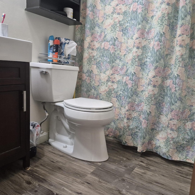 16 Oakwood Dr Unit 16, Claremont, NH 03743 - bathroom featuring wood finished floors and toilet