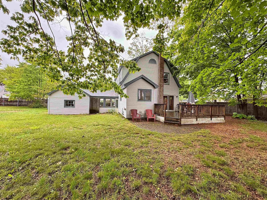 16 Sims St, Claremont, NH 03743 - rear view of house featuring a deck