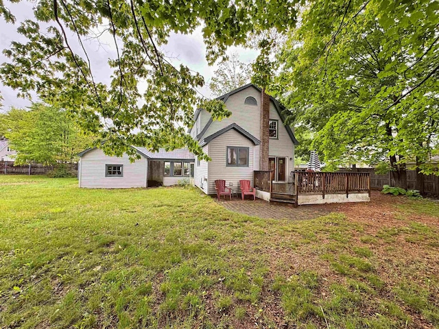 16 Sims St, Claremont, NH 03743 - rear view of house featuring a deck