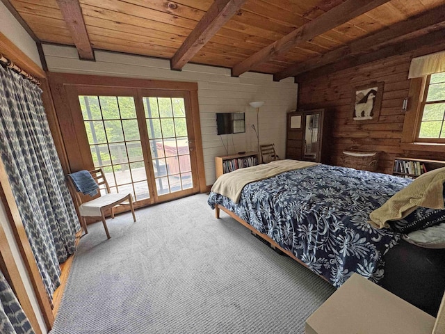 32 Christie Ln, Brattleboro, VT 05301 - carpeted bedroom featuring wood ceiling with exposed beams and access to exterior