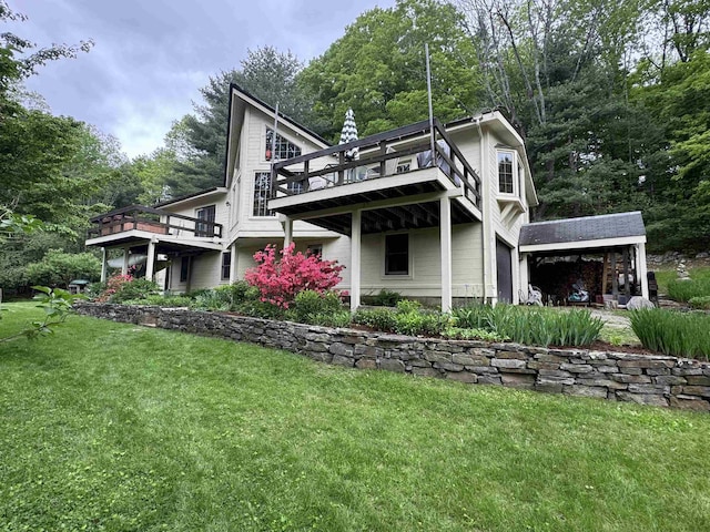 32 Christie Ln, Brattleboro, VT 05301 - back of house with a yard, a wooden deck, and a carport