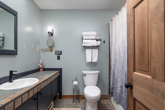 934 E Ash Rd Unit 14, Plymouth, VT 05056 - full bath featuring vanity, toilet, and baseboards