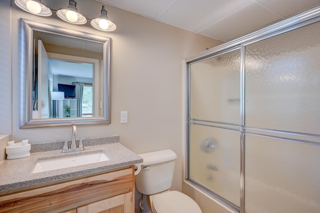 1-O River Run Rd Unit 0, Bartlett, NH 03812 - bathroom featuring vanity, bath / shower combo with glass door, and toilet