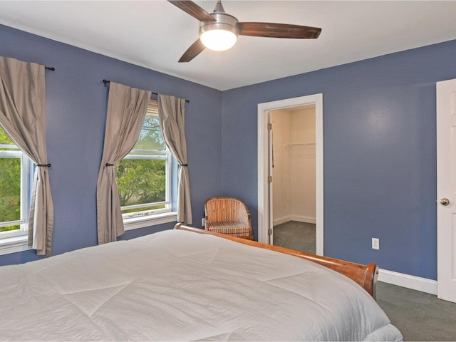 8 Checkerberry Sq Unit 106, Milton, VT 05468 - bedroom featuring carpet flooring, multiple windows, baseboards, and ceiling fan