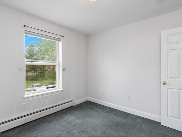 8 Checkerberry Sq Unit 106, Milton, VT 05468 - empty room featuring baseboard heating, dark carpet, and baseboards