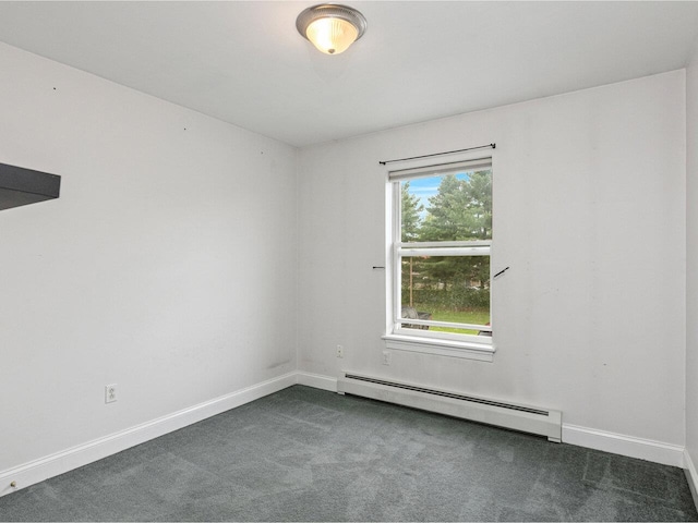 8 Checkerberry Sq Unit 106, Milton, VT 05468 - carpeted empty room featuring a baseboard heating unit and baseboards