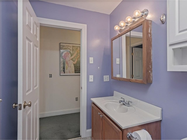 8 Checkerberry Sq Unit 106, Milton, VT 05468 - bathroom with vanity and baseboards